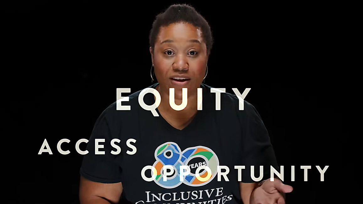 Black women narator with Inclusive Opportunities tshirt