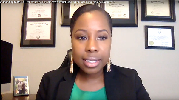 Screen shot of Executive Director of Impact Tulsa in her office in front of a wall of diplomas.