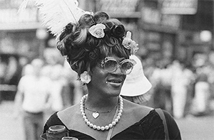 Archival photo of Ms. Johnson in iconic flower bonnet