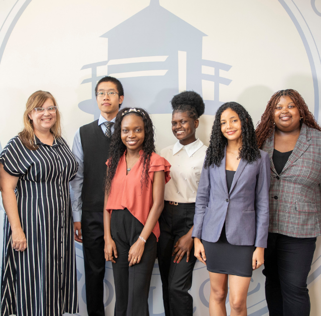 Three students in the Student Engagement Office
