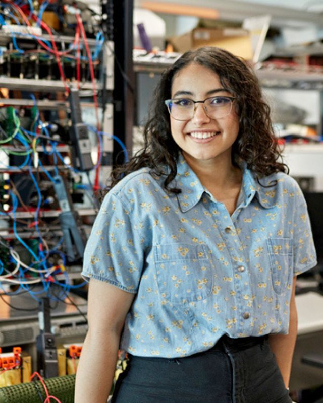 IT Professional smiling in work environment
