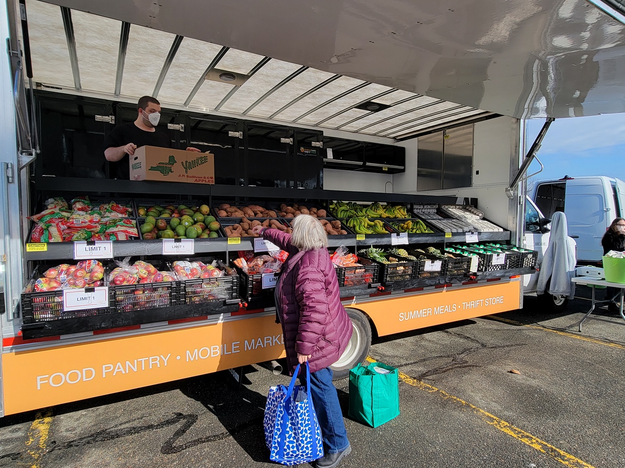 female and mobile market food truck
