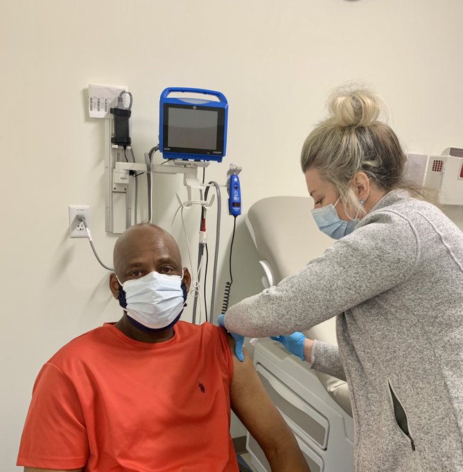 prez nate getting covid vax from nurse