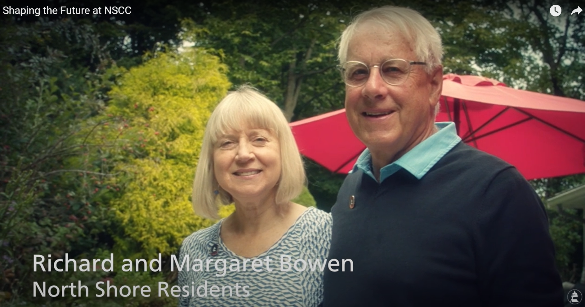 The Bowens standing outside in their lush green garden