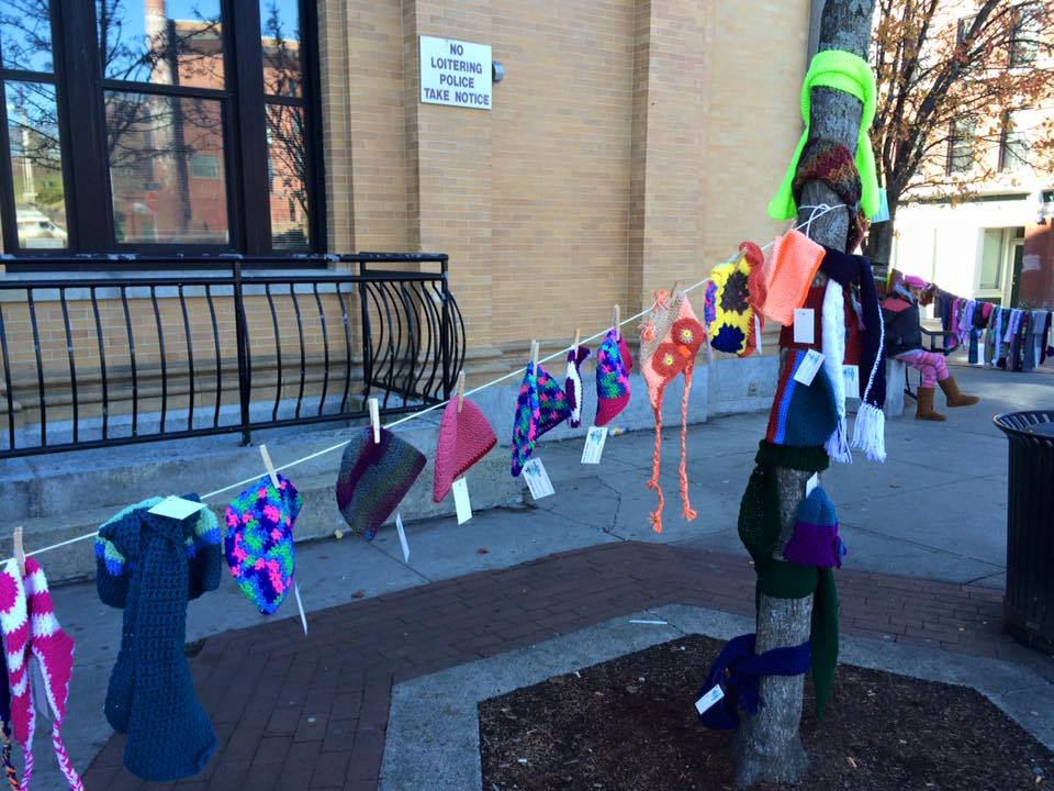 photo of knitted hats, mittens and gloves