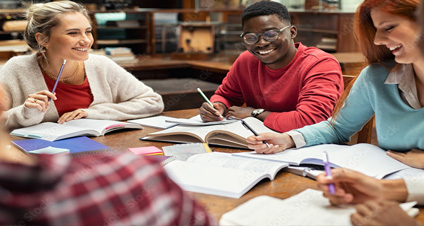 3 smiling college students studying