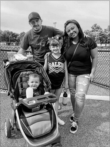 Thyda Doherty with husband and 2 daughters