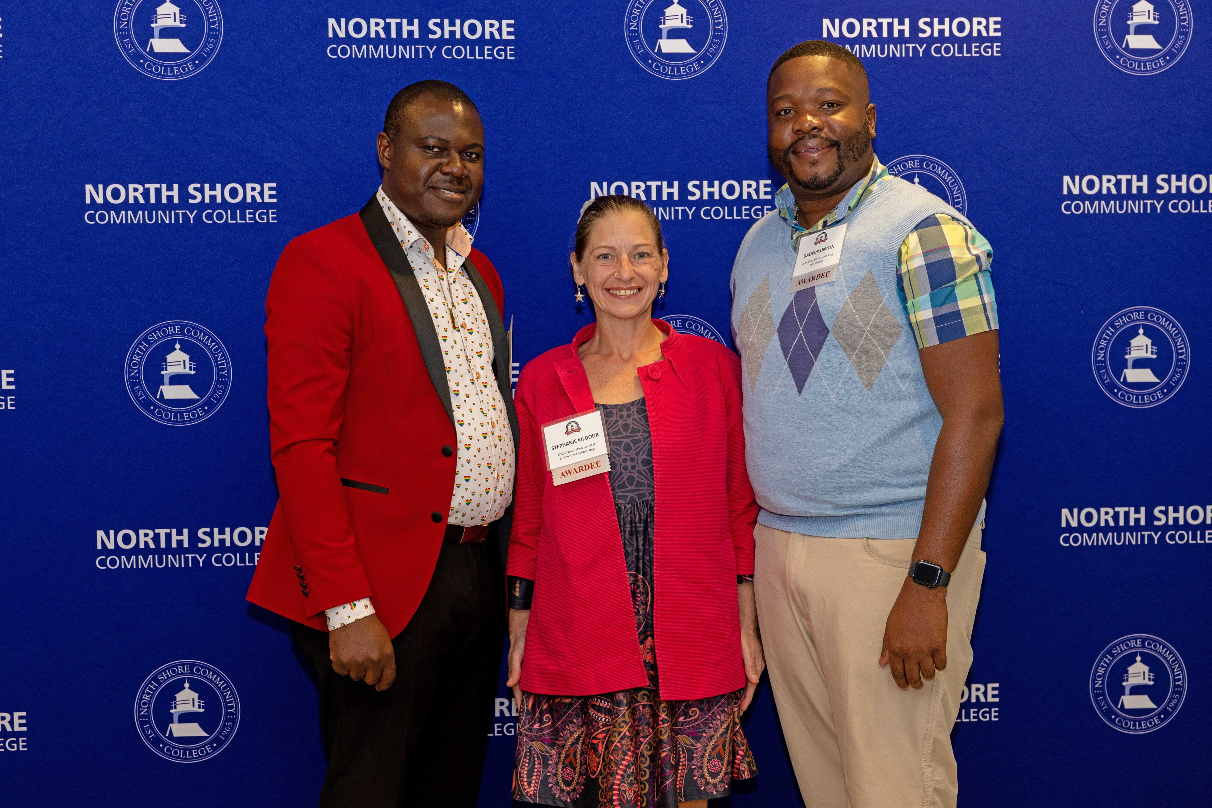 Three scholarship awardees at the event