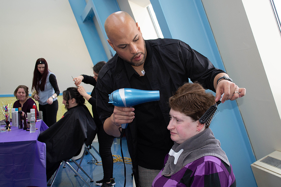 student styling hair