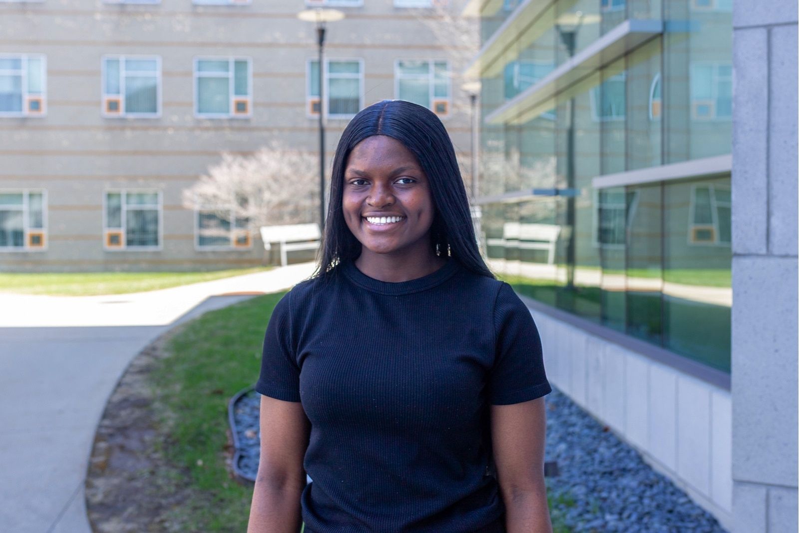 Bridget Ngu-Atem outside on Danvers Campus