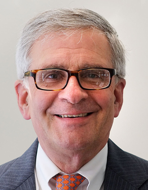 Portrait head shot of David Shribman in suit and tie