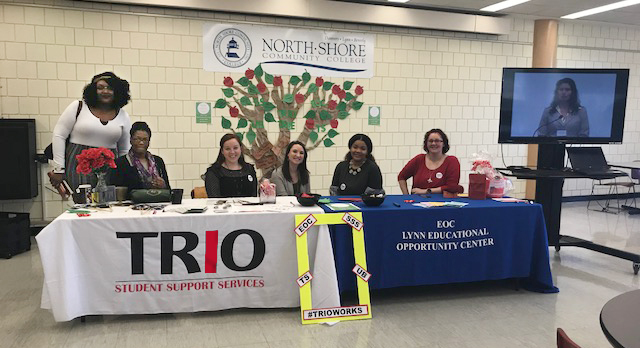 Two EOC staff at event table